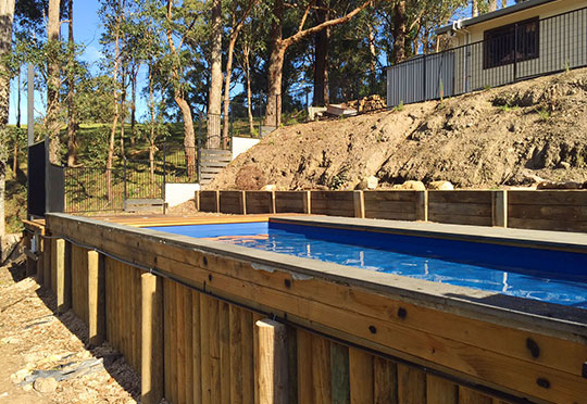 above ground pool sloping sites